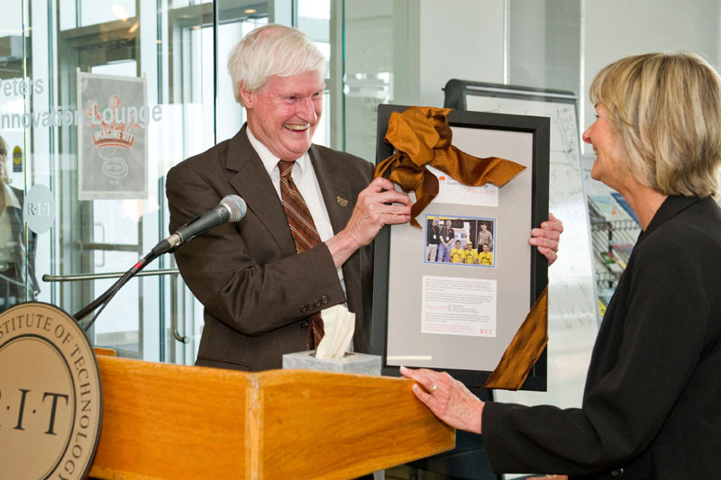 Wendy Peters accepted award from RIT on behalf of her late husband, John J. Peters