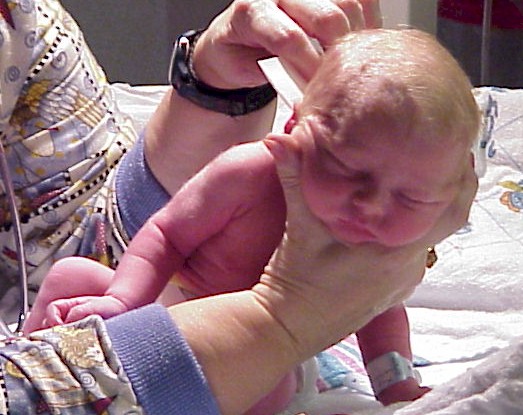 Mason getting his hair combed